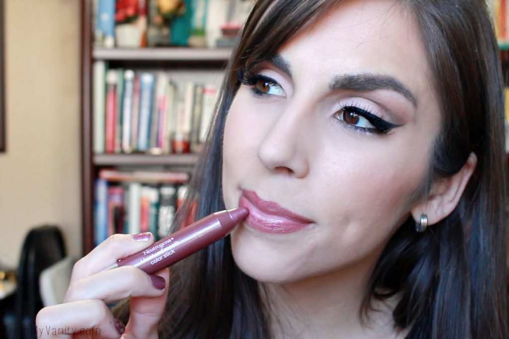 Sooth dry lips with Neutrogena® MoistureSmooth Color Stick in 70 Plum Perfect