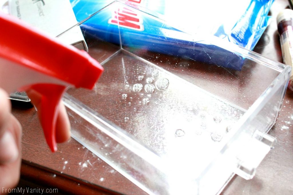 5 Tips to Keep Your Vanity Clean - Wipe Down Acrylic Drawers with Windex® Vinegar Multi-Surface Cleaner