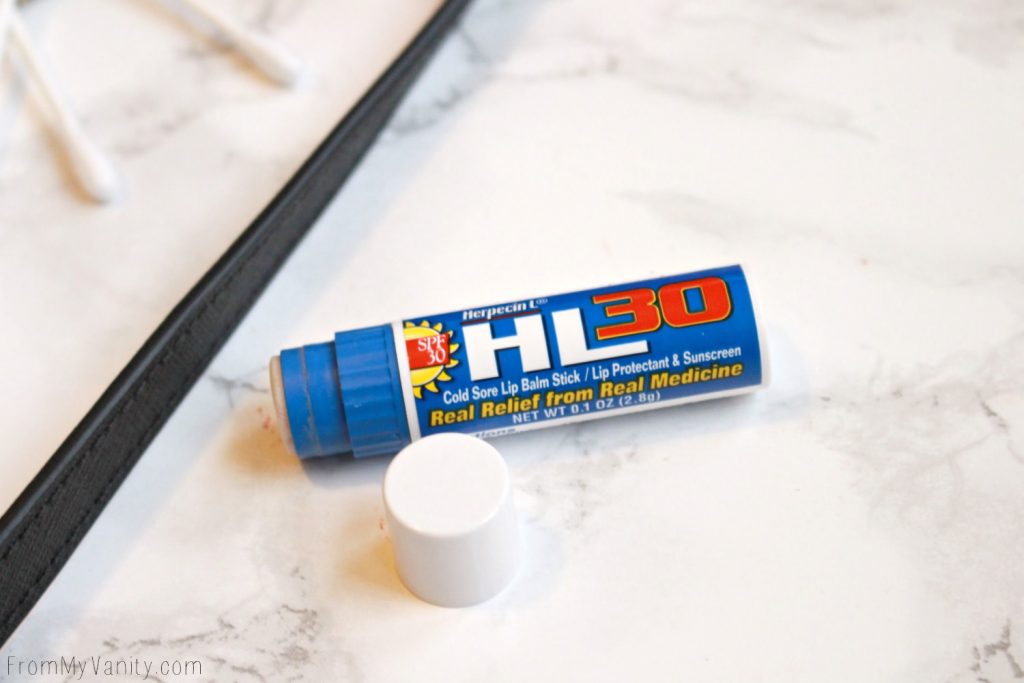 5 Purse Essentials Every (Practical) Makeup Junkie Needs | Herpecin L Lip Balm